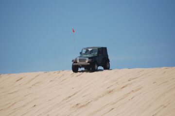 black jeep wrangler on desert