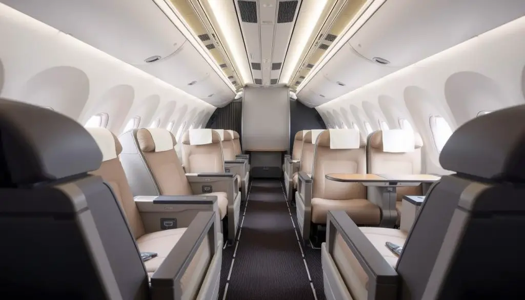 First Class cabin on a Boeing 737-800 showing the spacious recliner seats with extra legroom First Class cabin on a Boeing 737-800 showing the spacious recliner seats with extra legroom