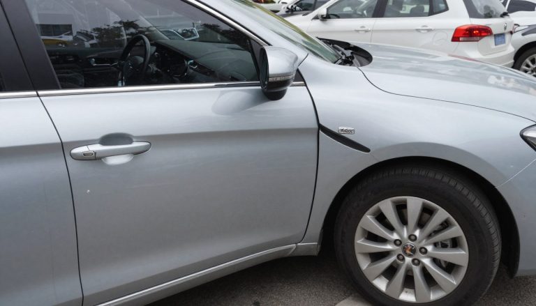 parking lot door ding accident steps showing damaged car door